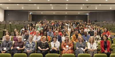 A group picture of attendees at the taught postgraduate conference, including Matt Frei